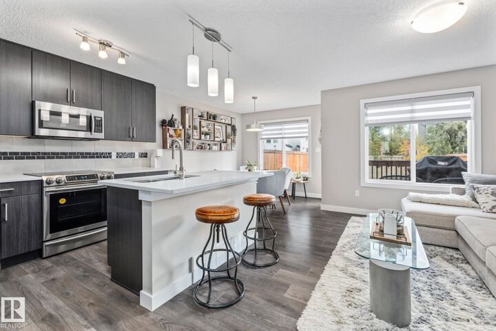 Property Photo: 5017 Andison Close SW AB T6W 3T3