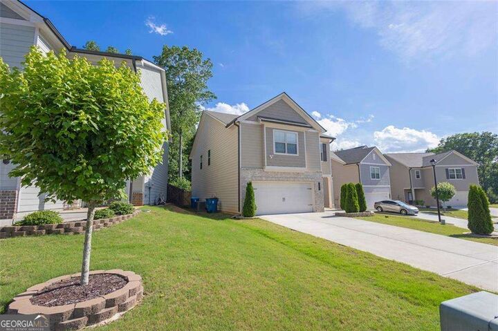 Property Photo:  104 Auburn Crossing Way  GA 30011 