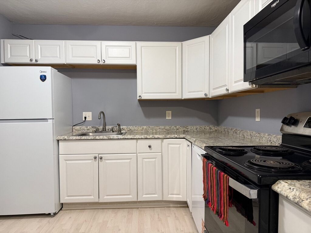 Property Photo:  302 Boston Post Rd 10  MA 01752 