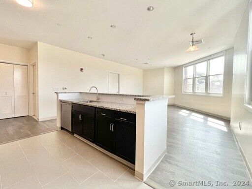 Property Photo: 215 Stillwater Avenue 319 CT 06902