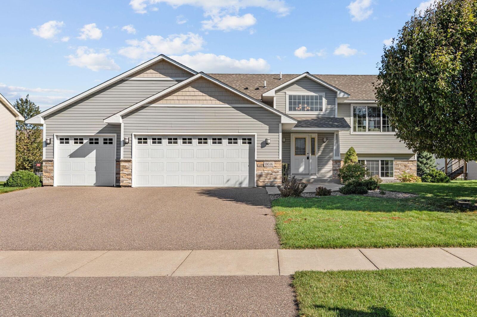 Property Photo: 8614 Tessman Parkway N MN 55445