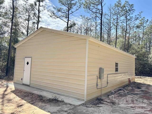 Property Photo: 6605 Dingo Dr FL 32583