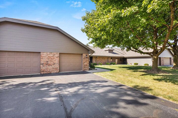 Property Photo:  83 Spencer Village Court  WI 54914 