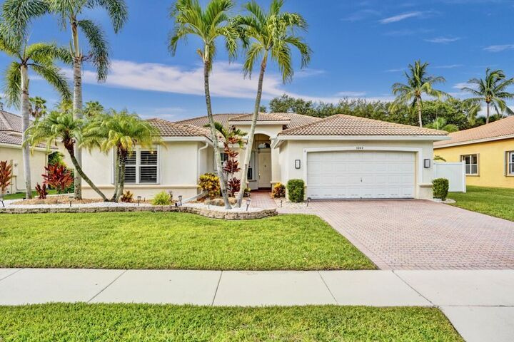 Property Photo:  5242 Indianwood Village Lane  FL 33463 