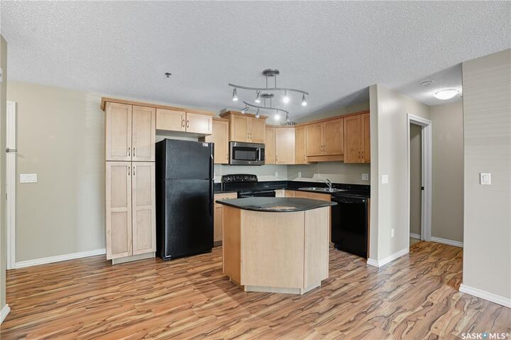 Property Photo: 103 Wellman Crescent B103 SK S7T 0C1