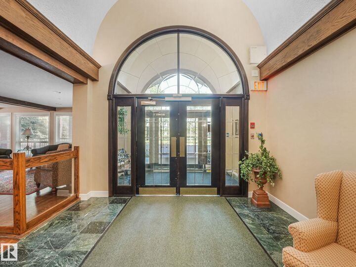 Property Photo: 6220 Fulton Road NW 211 AB T6A 3T4