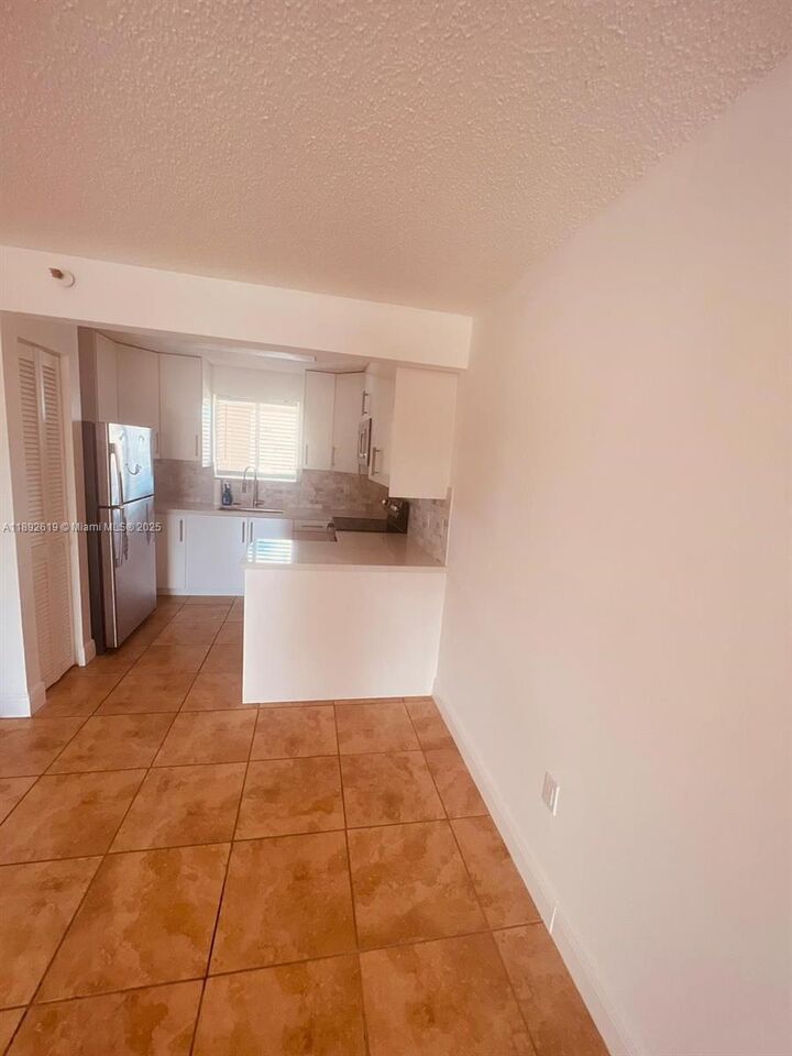 Property Photo: 7785 W 30th Ct F-210 FL 33018