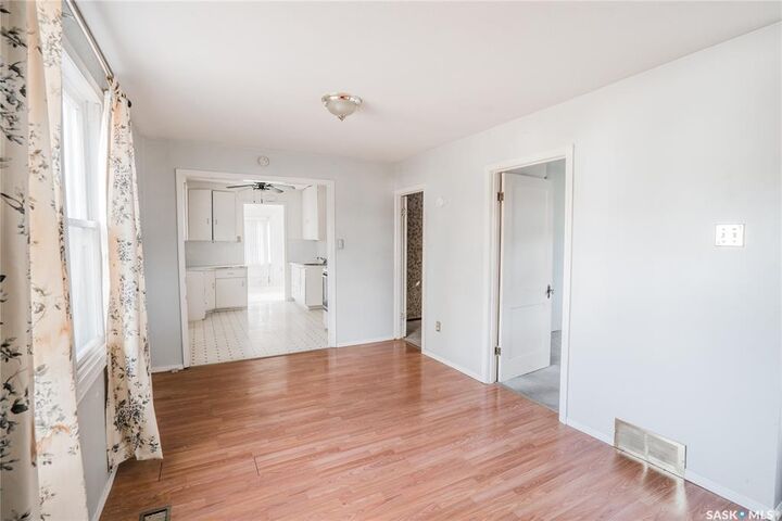Property Photo:  1002 J Avenue S  SK S7M 2B9 
