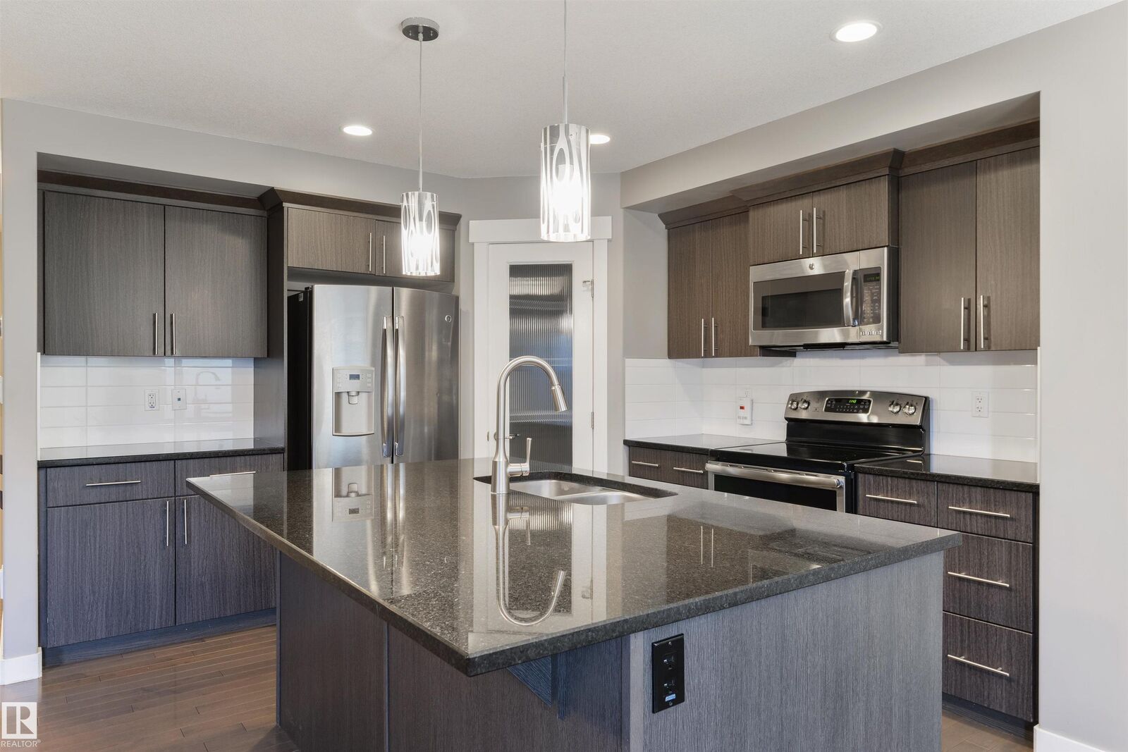 Property Photo: 2328 Ware Crescent NW AB T6W 2W5