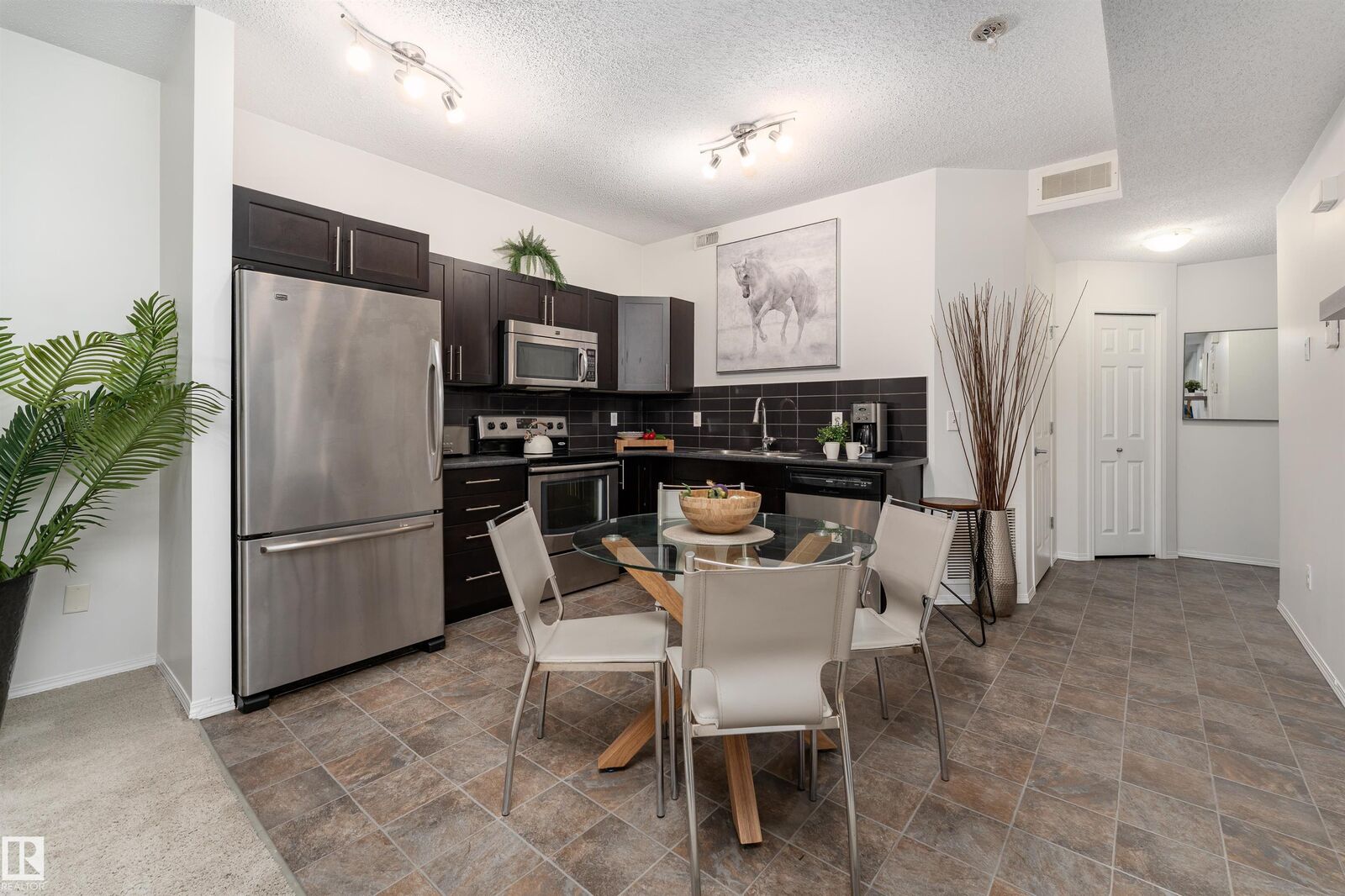 Property Photo: 6520 2 Avenue SW 22 AB T6X 1S4