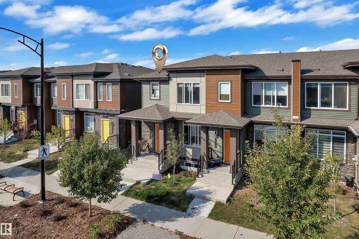 Property Photo: 1448 Keswick Drive SW AB T6W 4T9
