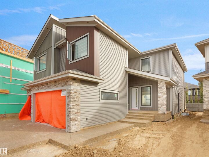 Property Photo: 4118 Ginsburg Place NW AB T5T 4V1