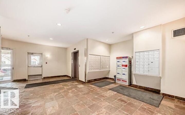 Property Photo: 4304 139 Avenue NW 322 AB T5Y 0H6