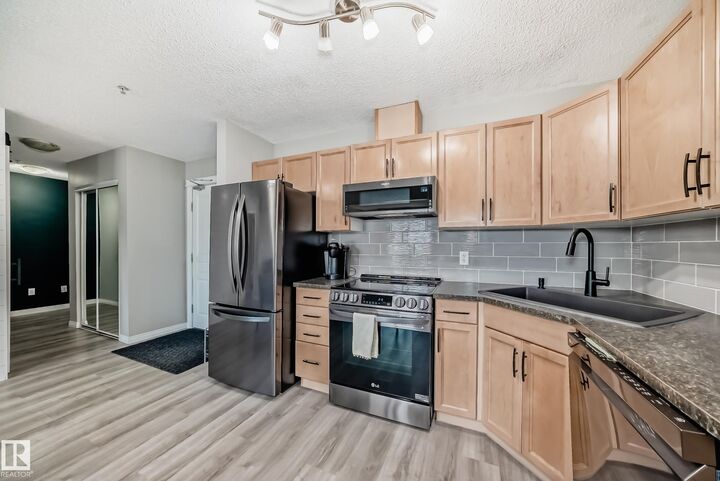 Property Photo: 309 Clareview Station Drive NW 118 AB T5Y 0C5