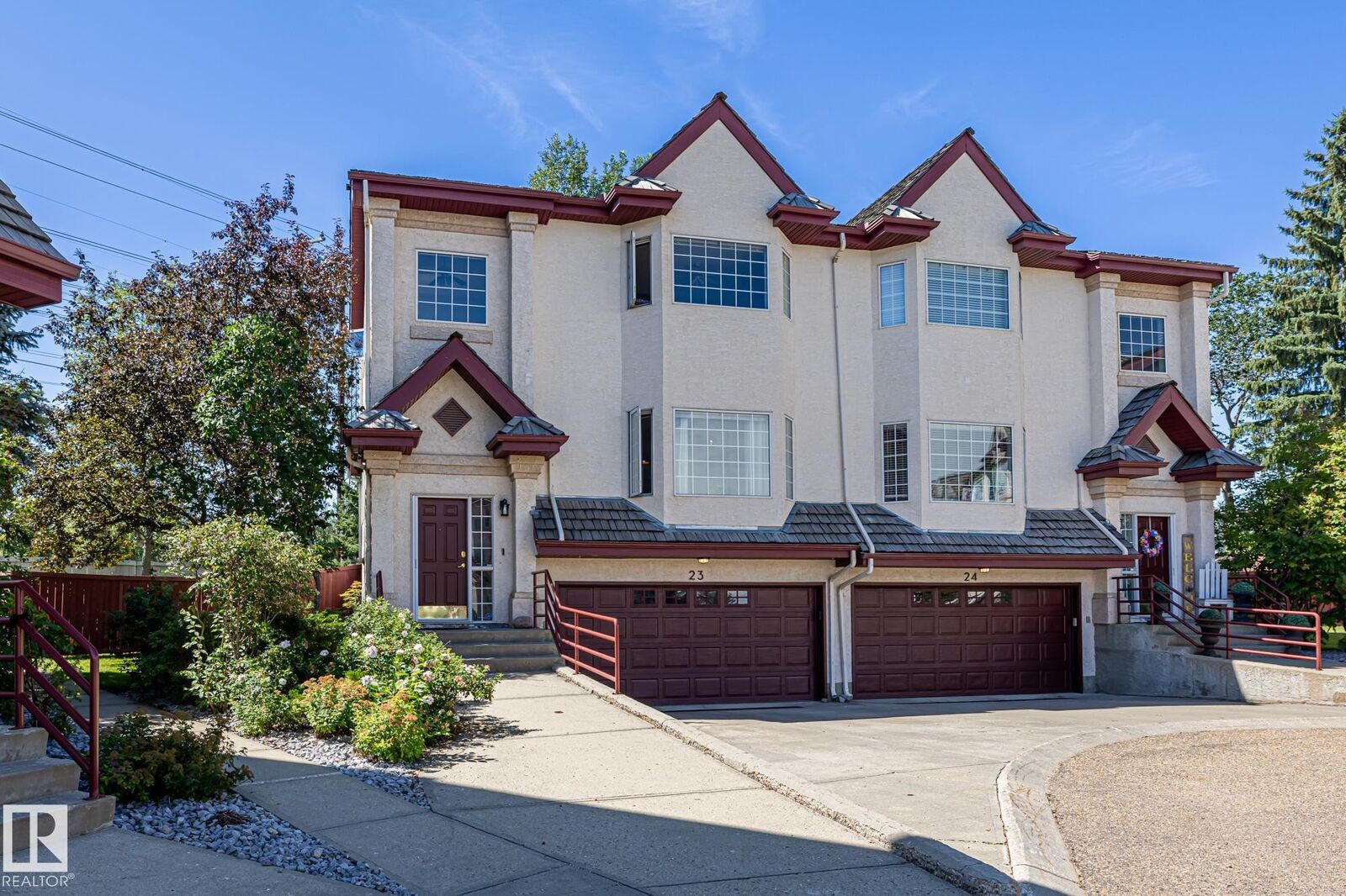 Property Photo: 1237 Carter Crest Road NW 23 AB T6R 2R2