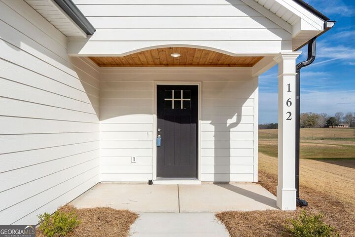 Property Photo:  162 Mathews Road  GA 30257 