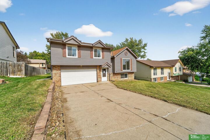 Property Photo: 3716 Lookingglass Drive NE 68123