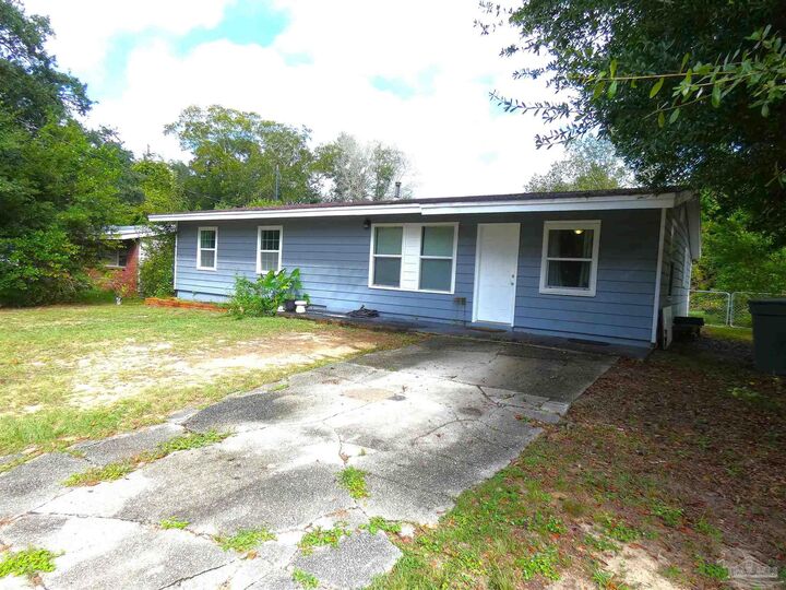 Property Photo:  7704 W Gadsden St  FL 32506 