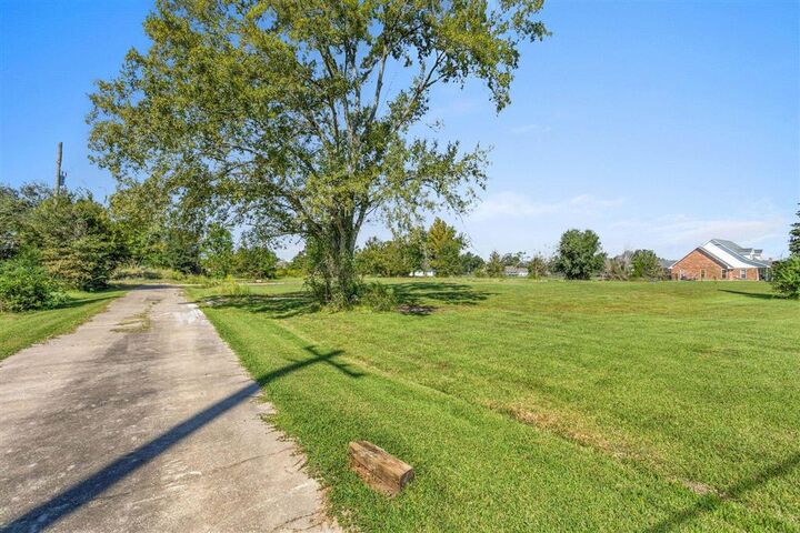 Property Photo:  7142 Elliott Road  LA 70605 
