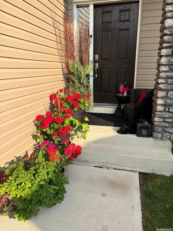 Property Photo: 410 Ledingham Way 112 SK S7V 0C4