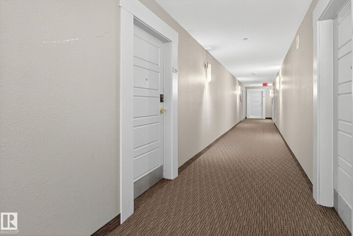 Property Photo: 6084 Stanton Drive SW 304 AB T6X 0Z4