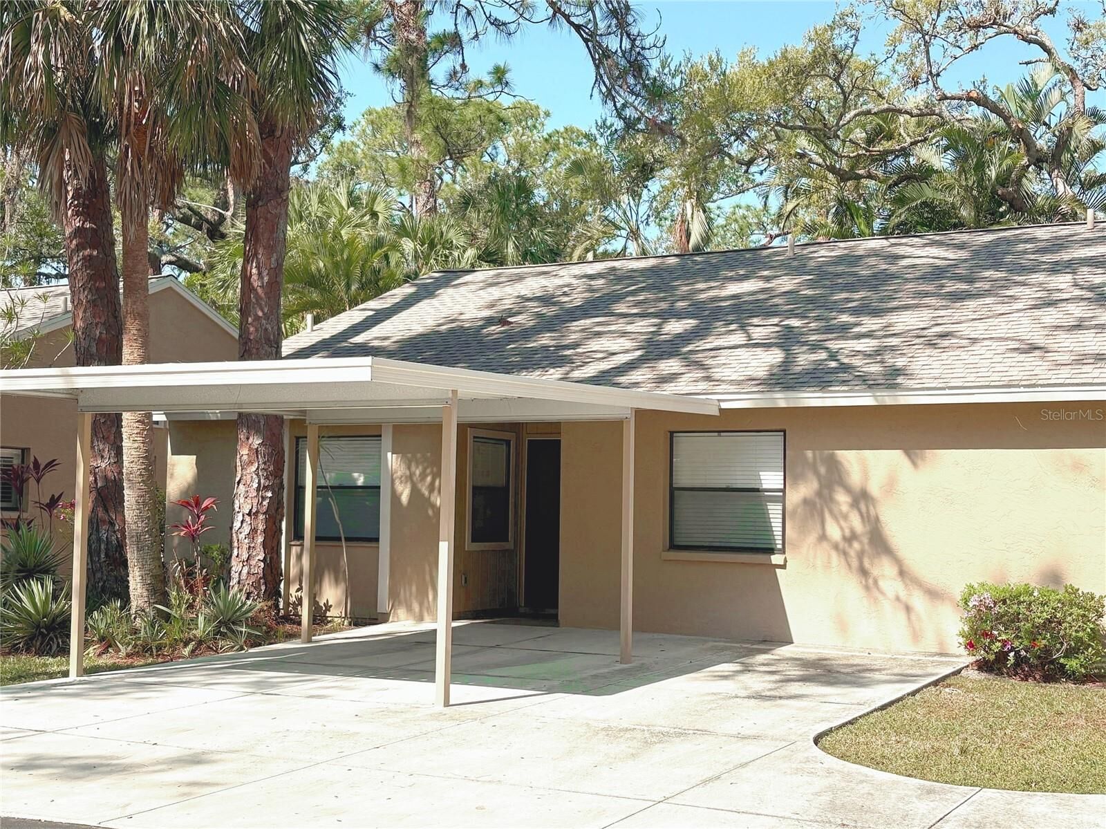 Property Photo: 4933 Village Gardens Drive 211 FL 34234