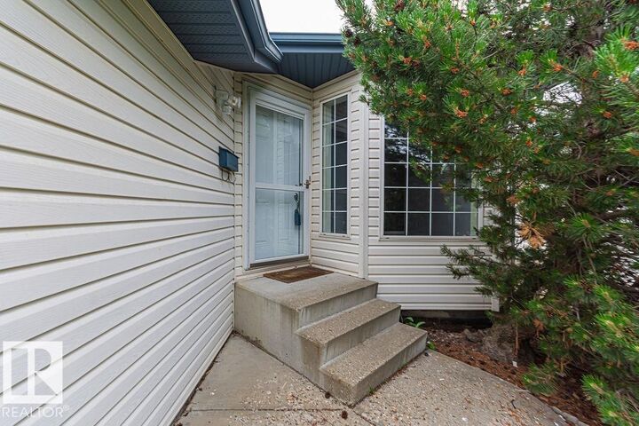 Property Photo: 13107 36 Street NW AB T5A 5C7