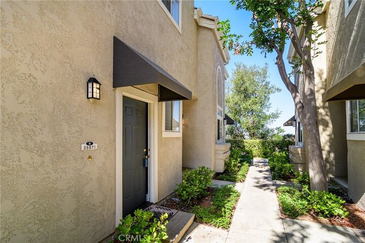 Property Photo: 25071 Calle Playa H CA 92677