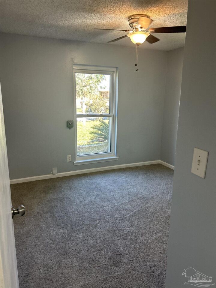 Property Photo:  7911 Burstaff Rd  FL 32514 