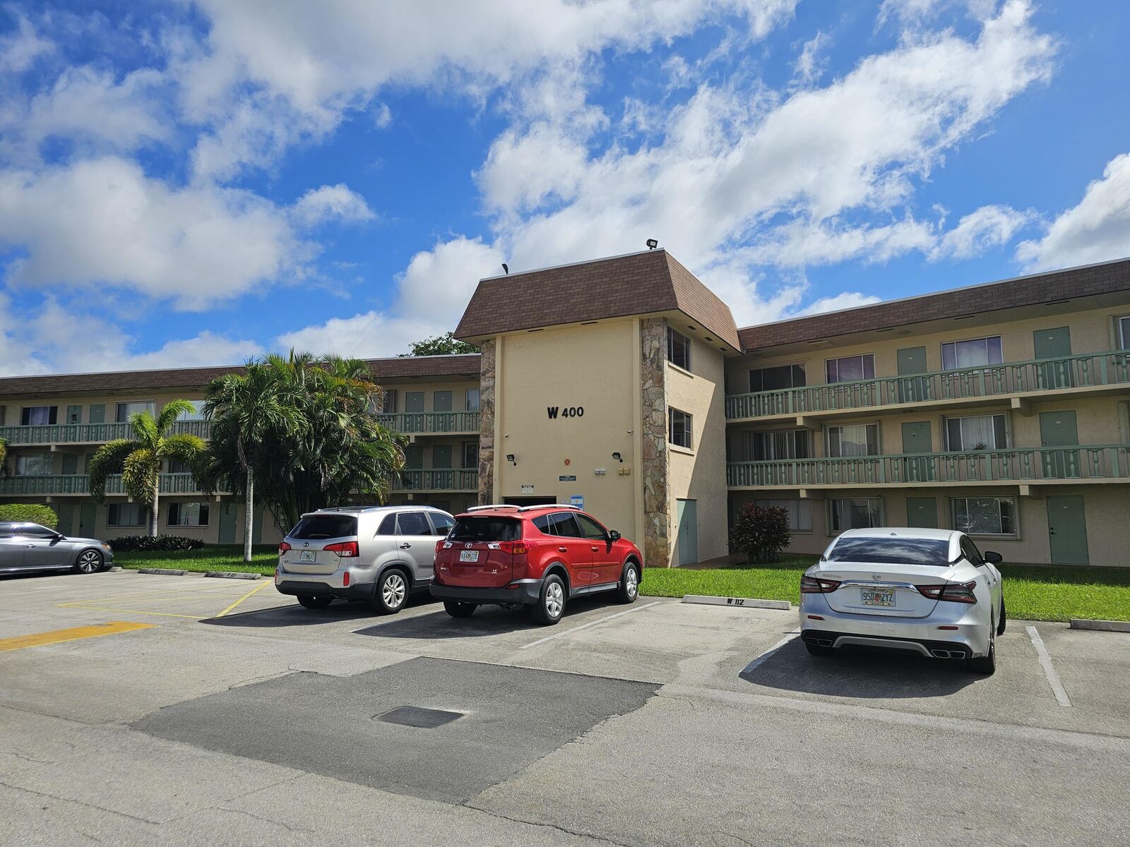 Property Photo: 400 Village Green Circle W 205 FL 33461