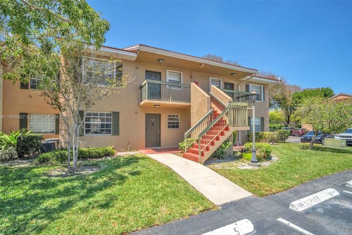 Property Photo:  10457 NW 8th St 105  FL 33026