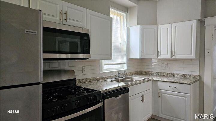 Property Photo: 6522 Bartmer MO 63130