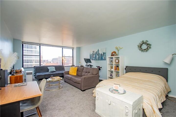 Property Photo:  112 Washington Pl 8K  PA 15219 