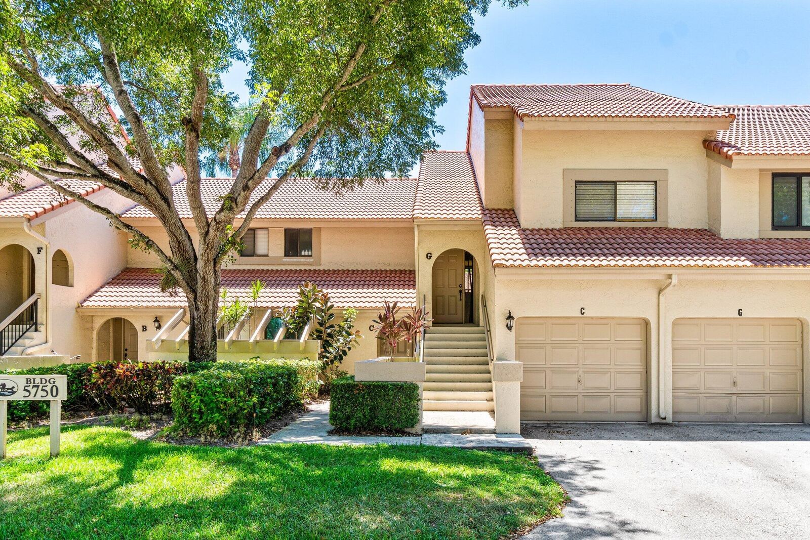 Property Photo:  5750 Coach House Circle C  FL 33486 