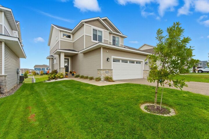 Property Photo:  8215 Deerwood Lane N  MN 55369