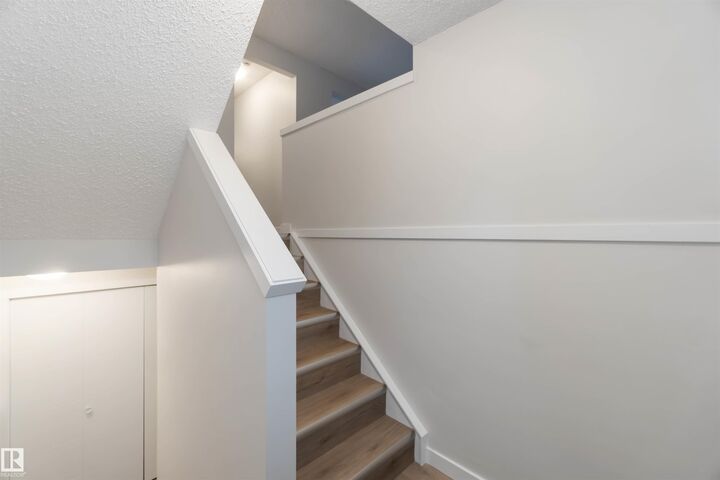 Property Photo:  10406B 28A Avenue NW  AB T6J 4J6 