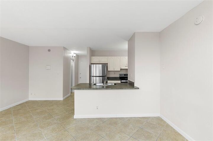 Property Photo:  2401 Riverside Dr 518B  FL 33065 