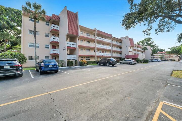 Property Photo:  1015 Country Club Dr 203  FL 33063 