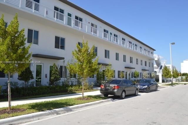 Property Photo:  6416 NW 102 Court 110  FL 33178