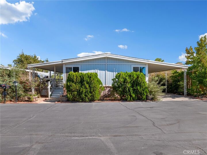 Property Photo:  14000 El Evado 4  CA 92392 