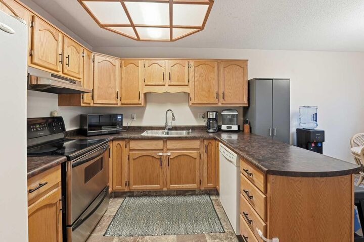 Property Photo:  62 McLevin Crescent  AB T4R 1S9