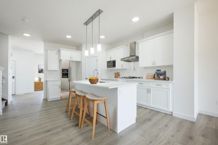 Property Photo:  239 157 NE  AB T5Y 6K8