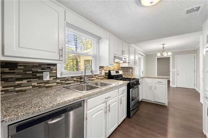 Property Photo:  4574 Woodland Circle NE  GA 30075 