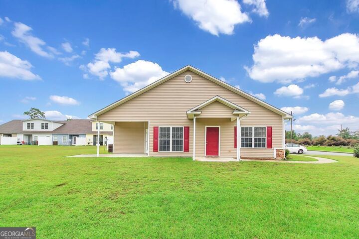 Property Photo:  401 Barry McCaffrey Boulevard K2  GA 31313