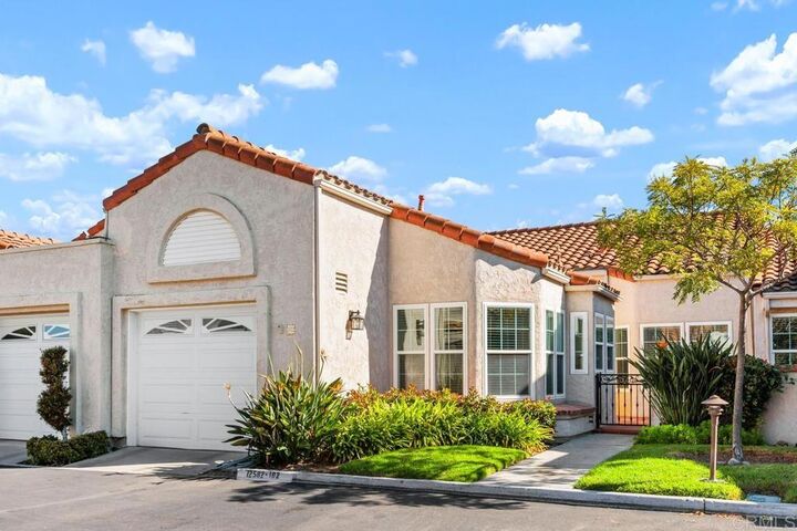 Property Photo:  12582 Calle Tamega 102  CA 92128 
