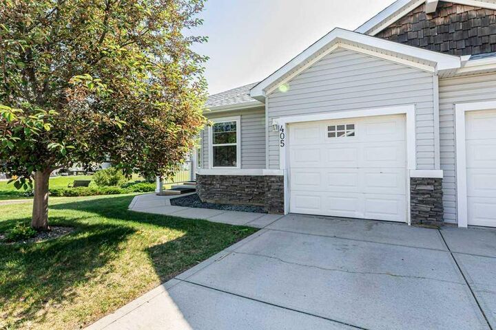 Property Photo:  405 Jenkins Drive  AB T4P 3X1 