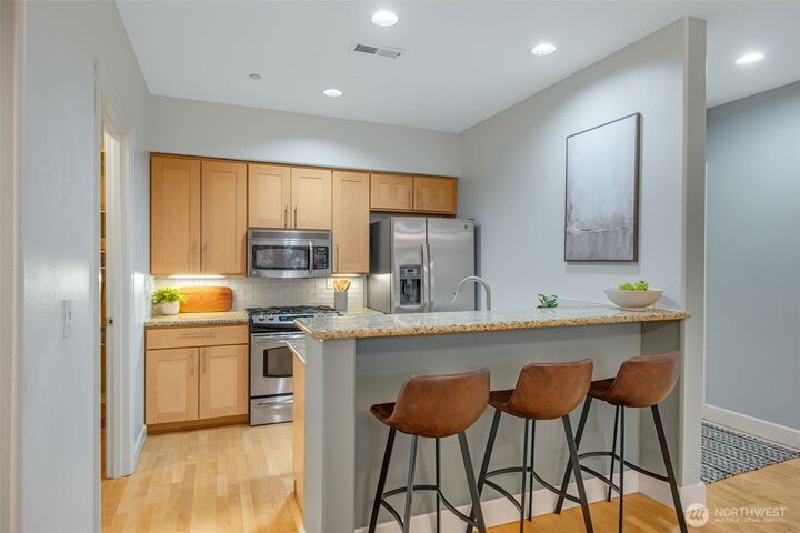 Property Photo:  360  Knechtel Way NE 307  WA 98110