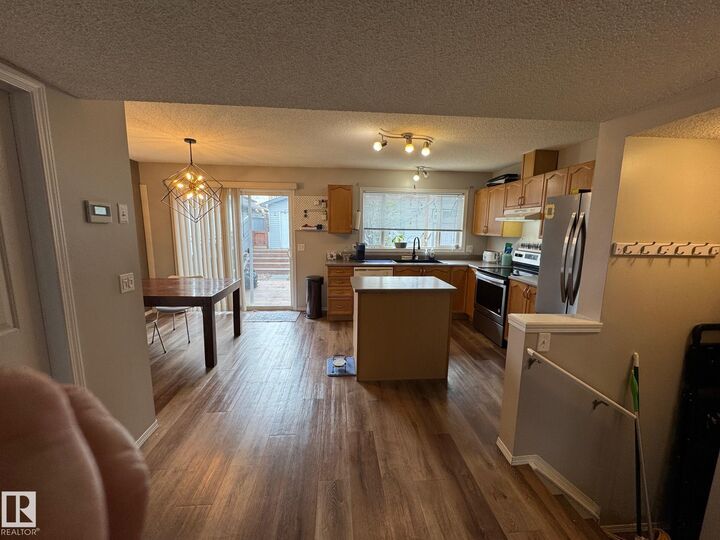 Property Photo:  20235 56 Avenue NW  AB T6M 0B3 