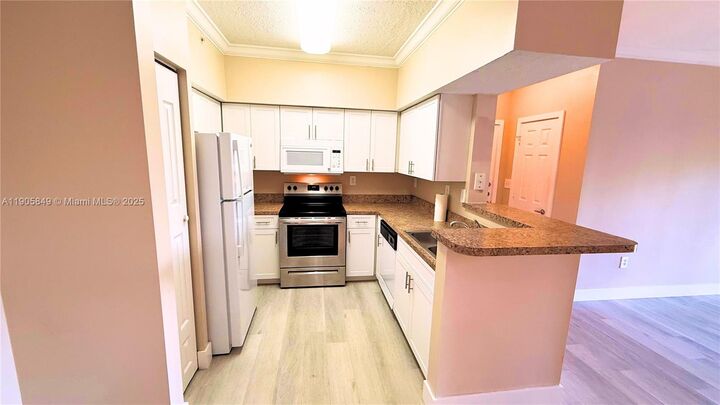 Property Photo: 101 SW 117th Ave 7305 FL 33025