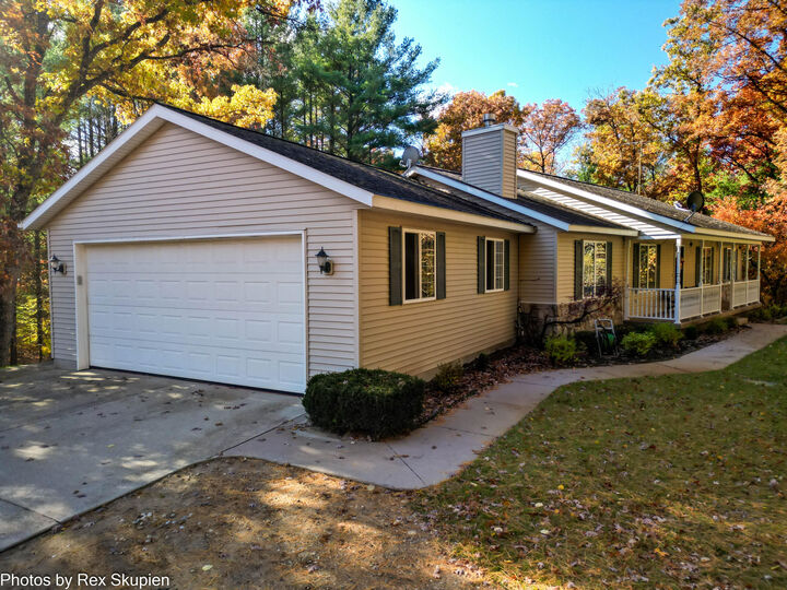 Property Photo:  8110 S Basswood Drive  MI 49337 